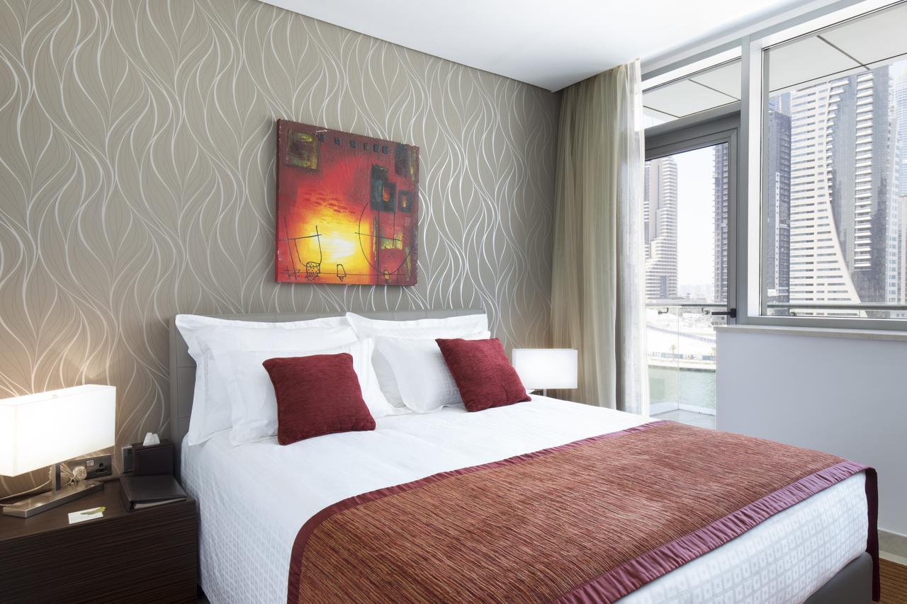 La Verda Suites And Villas Dubai Marina 部屋 写真 A bedroom at the hotel